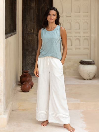 Model wears Carabella Cotton Pants in Ivory & Soleil Cotton Tank Top in Steel