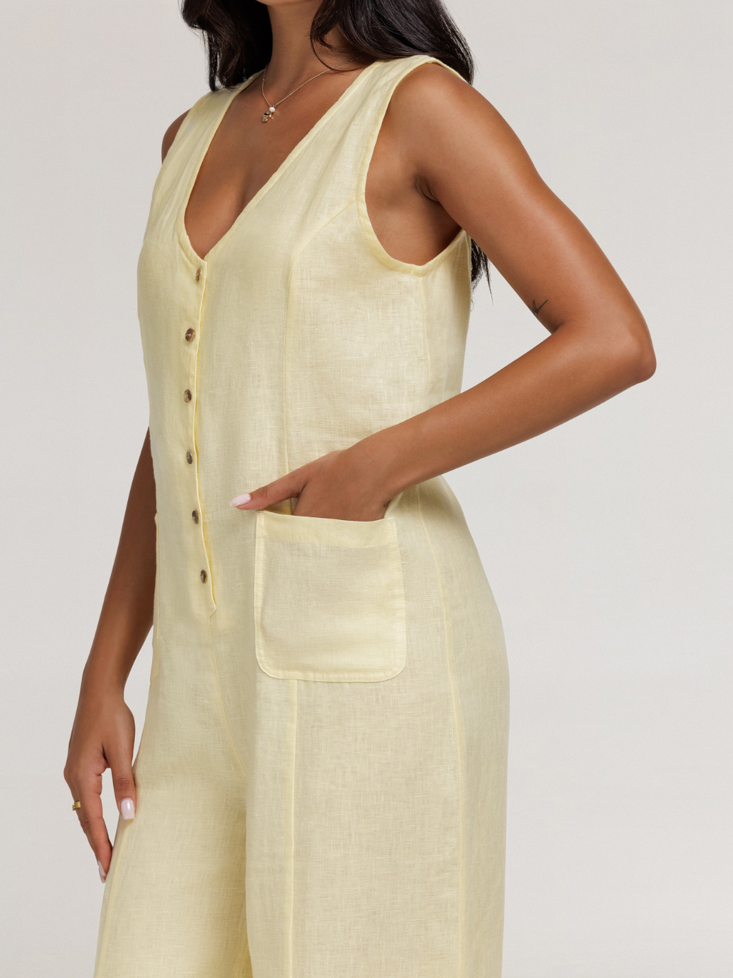 Model wears Florentina Linen Jumpsuit in Lemon