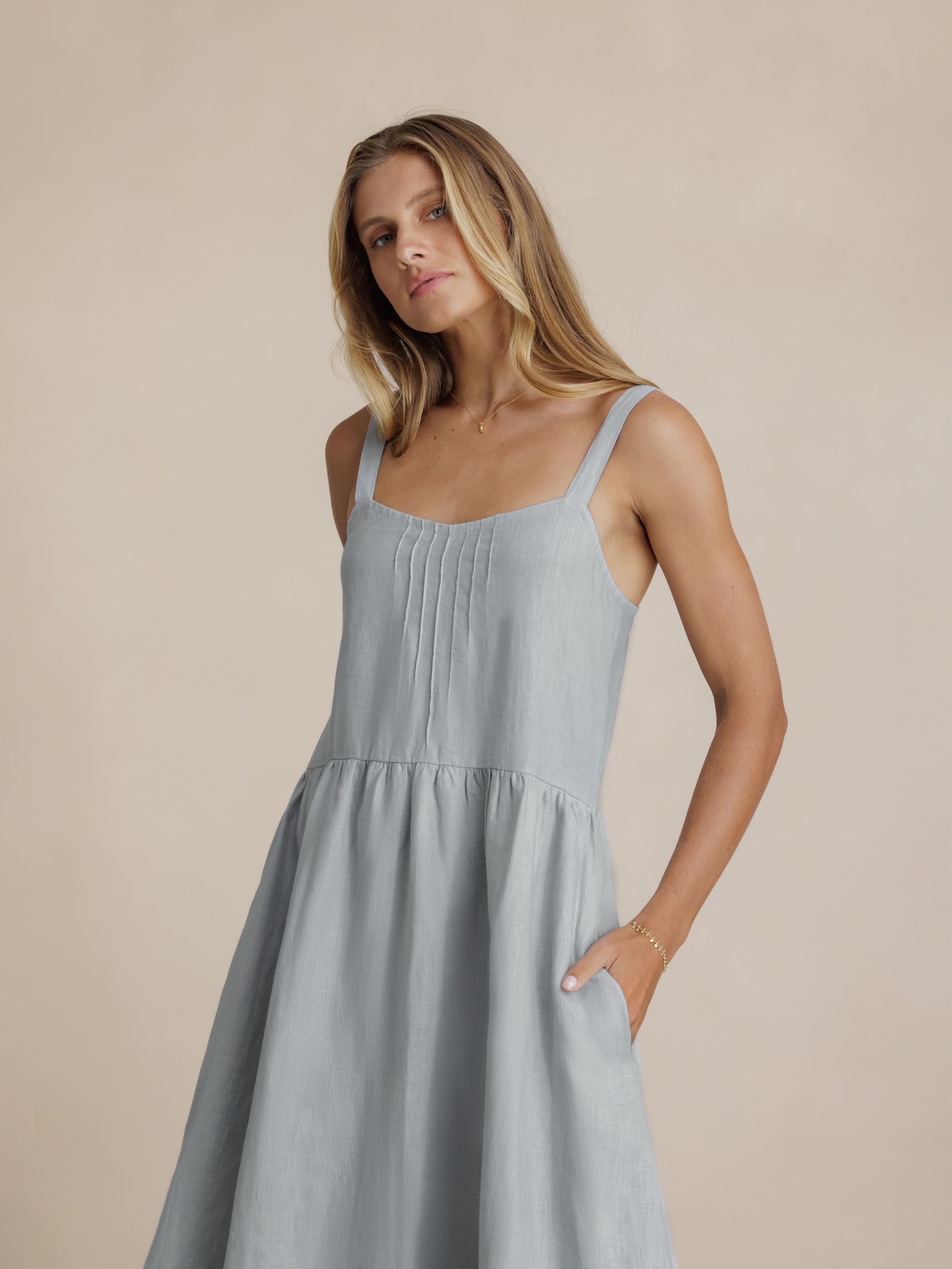 Model wears Maeve Linen Midi Dress in Slate Blue