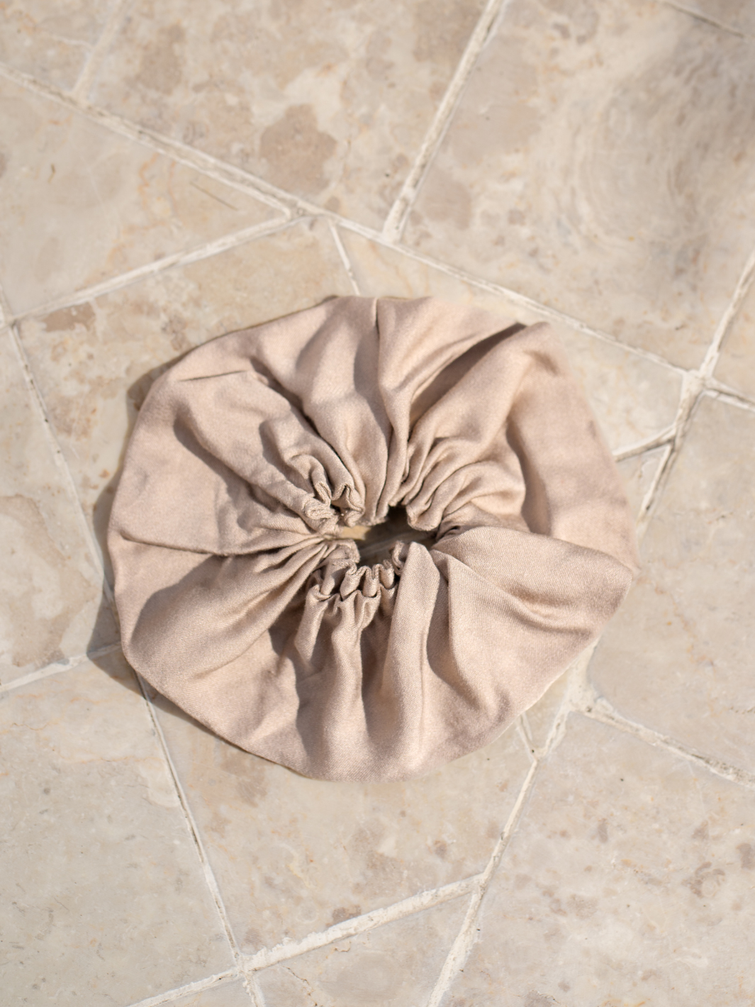 Image features Jumbo Bamboo Scrunchie in Champagne