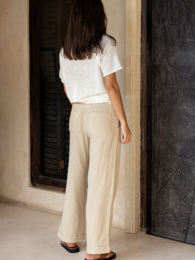 Model wears Sancia Cotton Pants in Stone