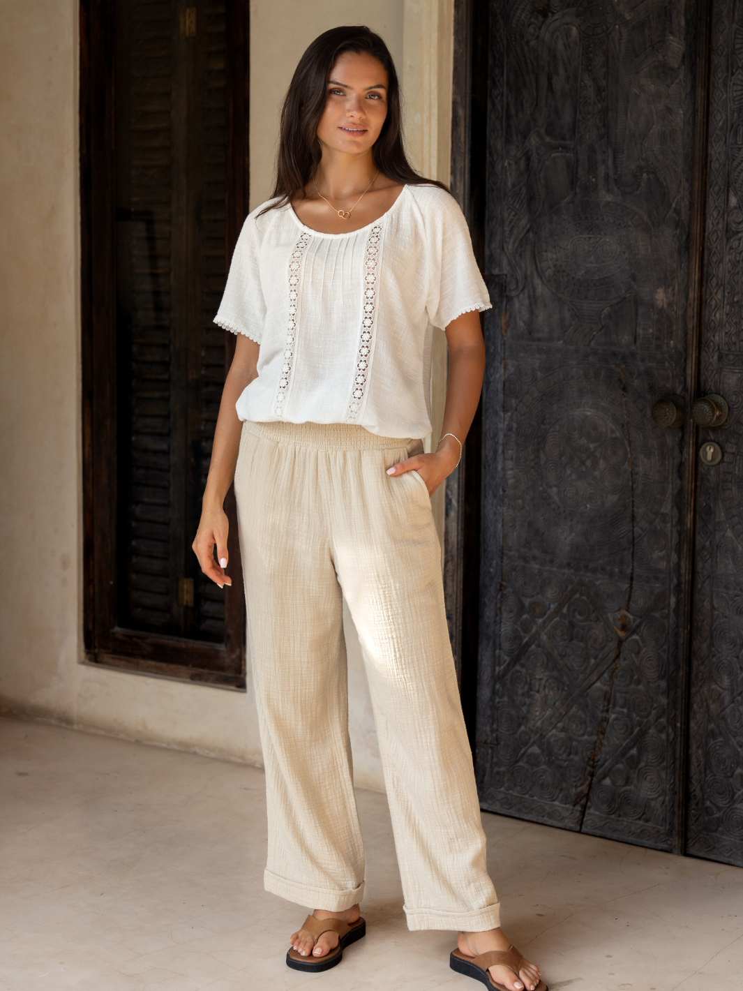 Model wears Sancia Cotton Pants in Stone