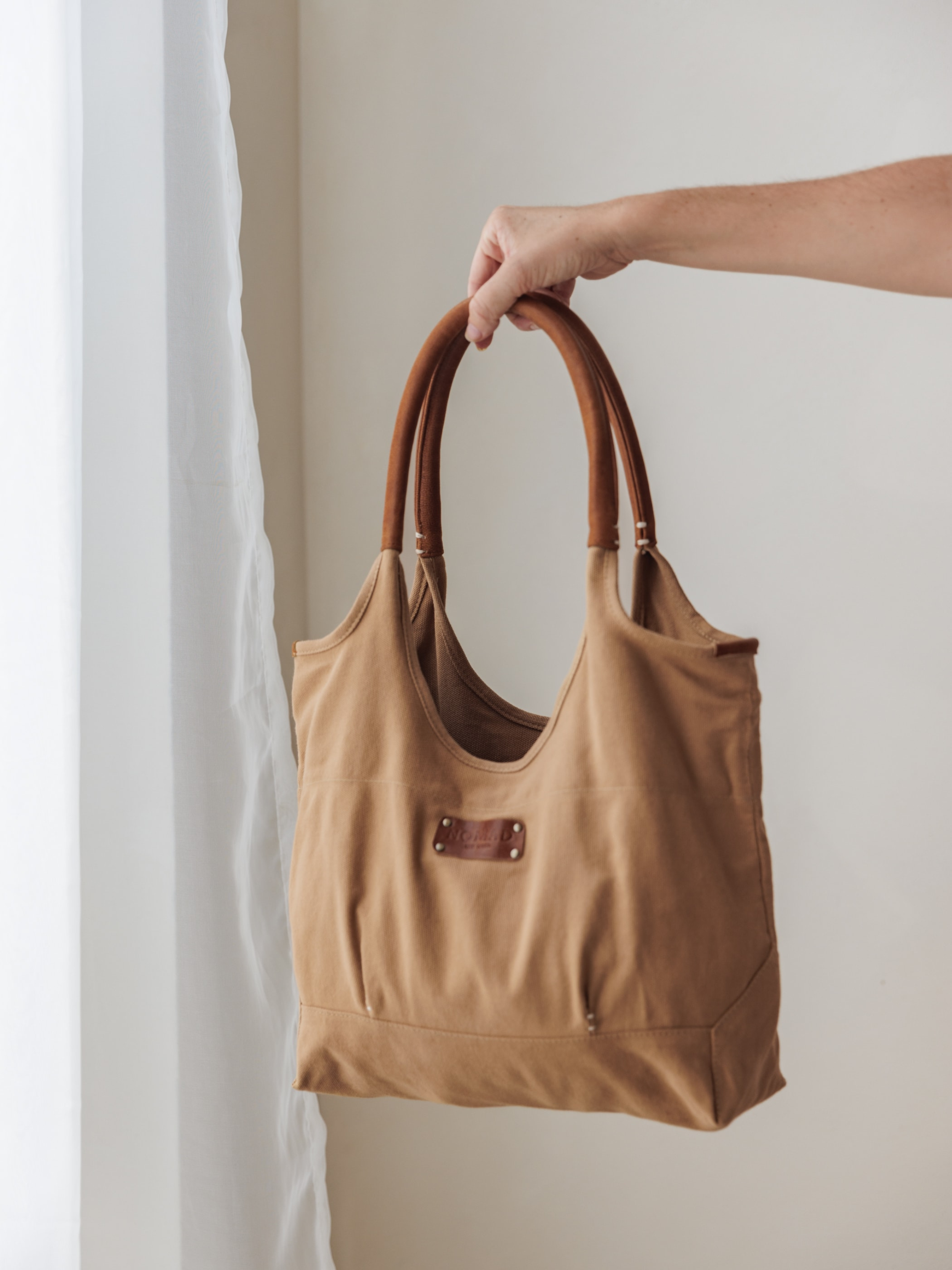 Image features Havana Canvas Tote in Desert Sand