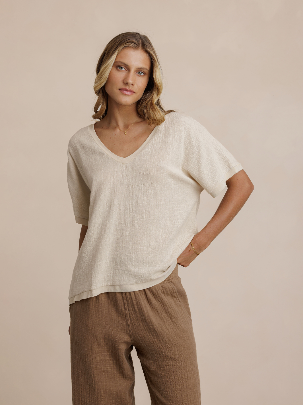 Model wears Montego Cotton Top in Stone & Sancia Cotton Pants in Desert Sand