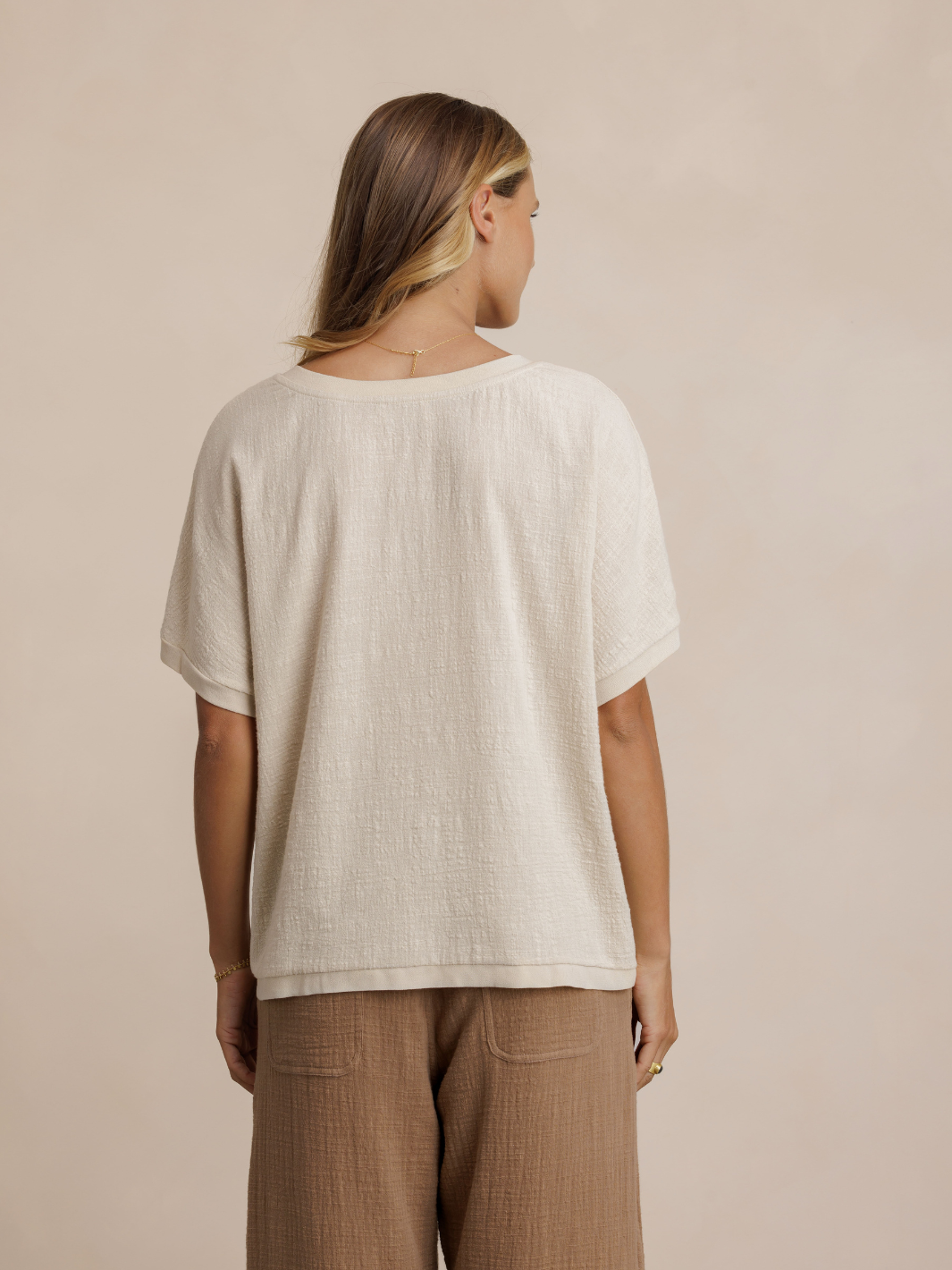 Model wears Montego Cotton Top in Stone & Sancia Cotton Pants in Desert Sand