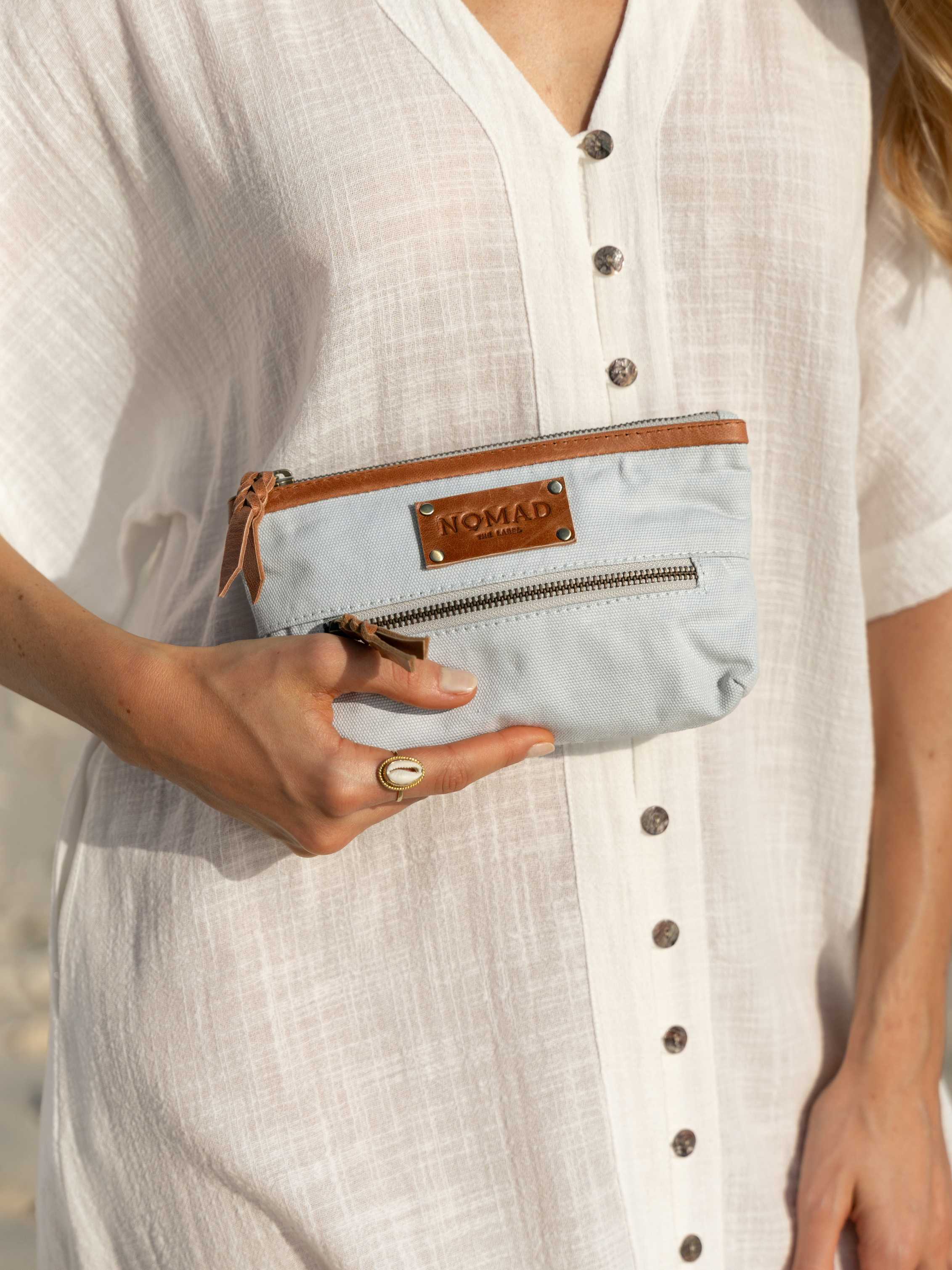 Image features Avalon Canvas Clutch in Slate Blue