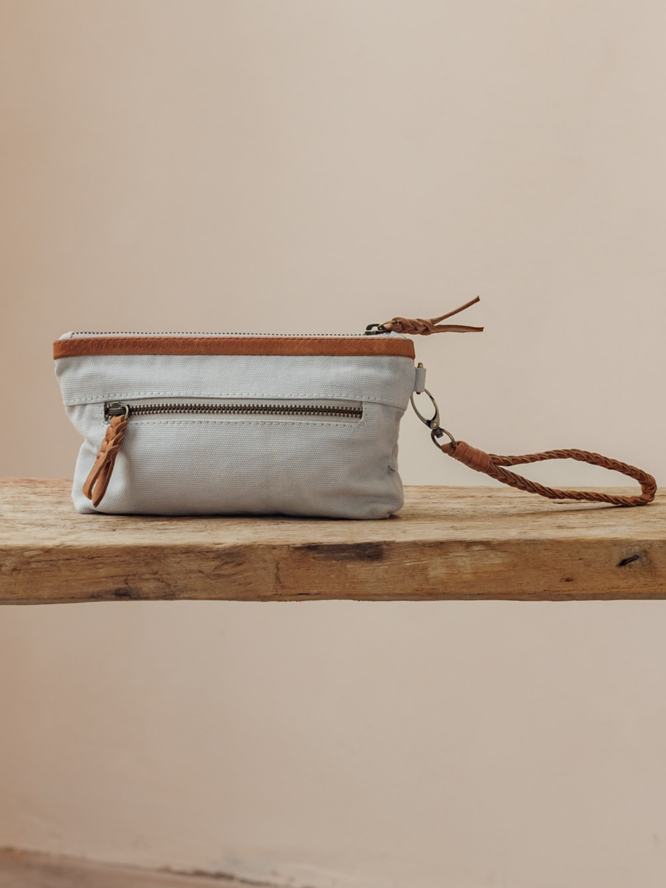 Image features Avalon Canvas Clutch in Slate Blue