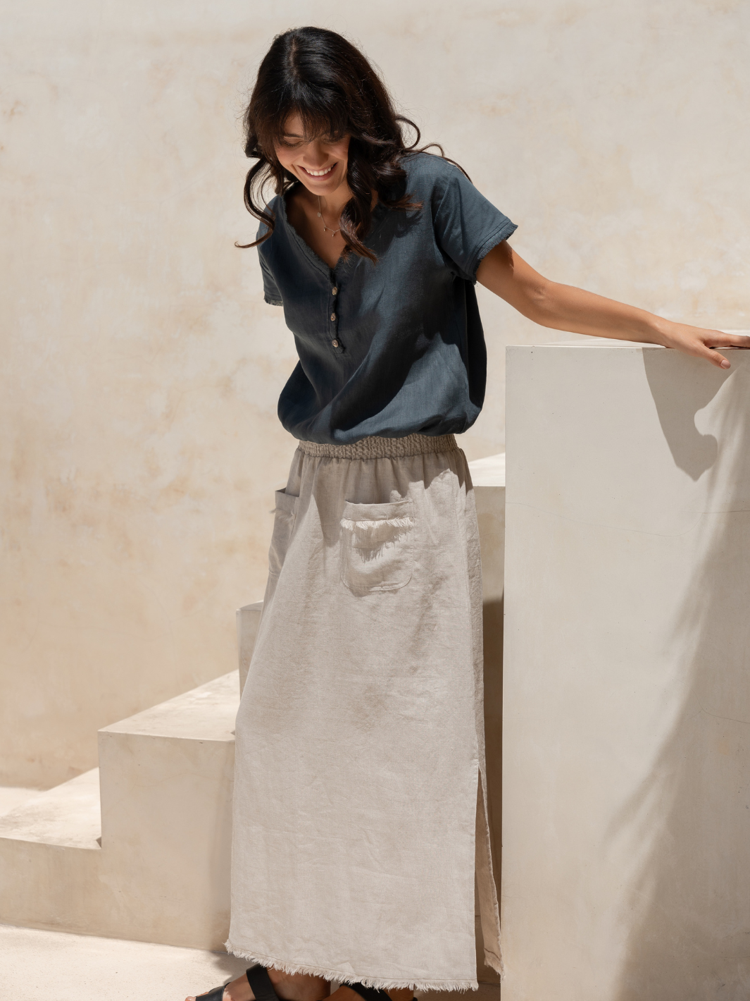 Model wears Aurora French Linen Skirt in Flax