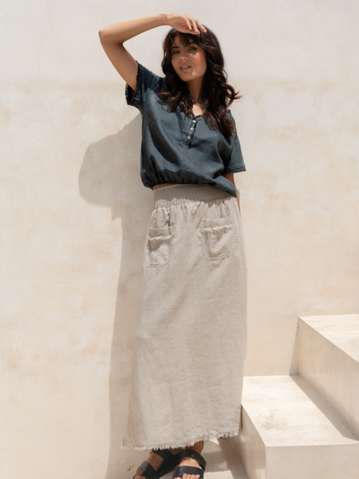 Model wears Aurora French Linen Skirt in Flax