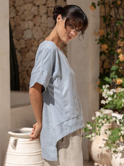 Model wears Costa French Linen and Cotton Top in Slate Blue.