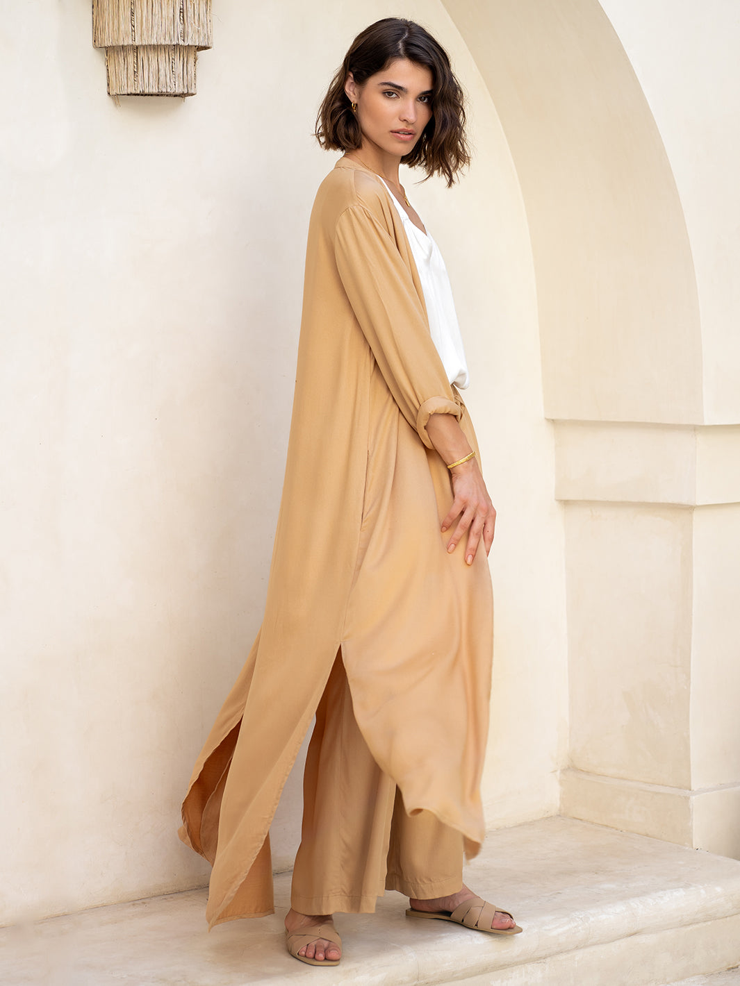 Model wears Carmel Ecovero™ Shirt Dress in Camel