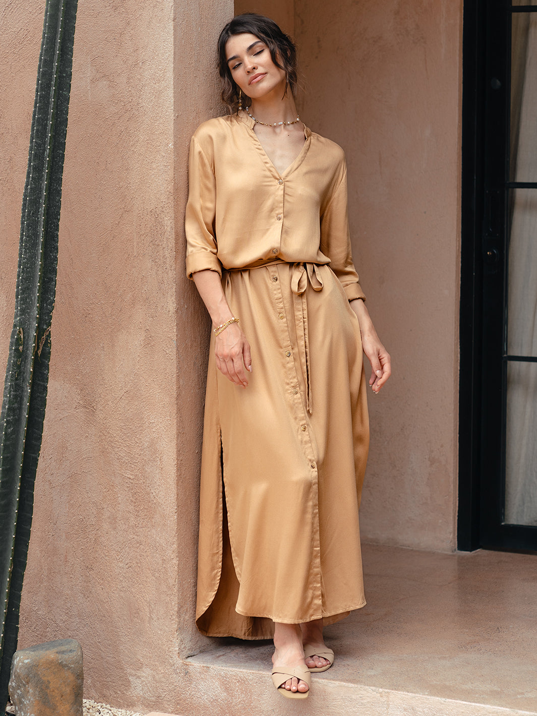 Model wears Carmel Ecovero™ Shirt Dress in Camel