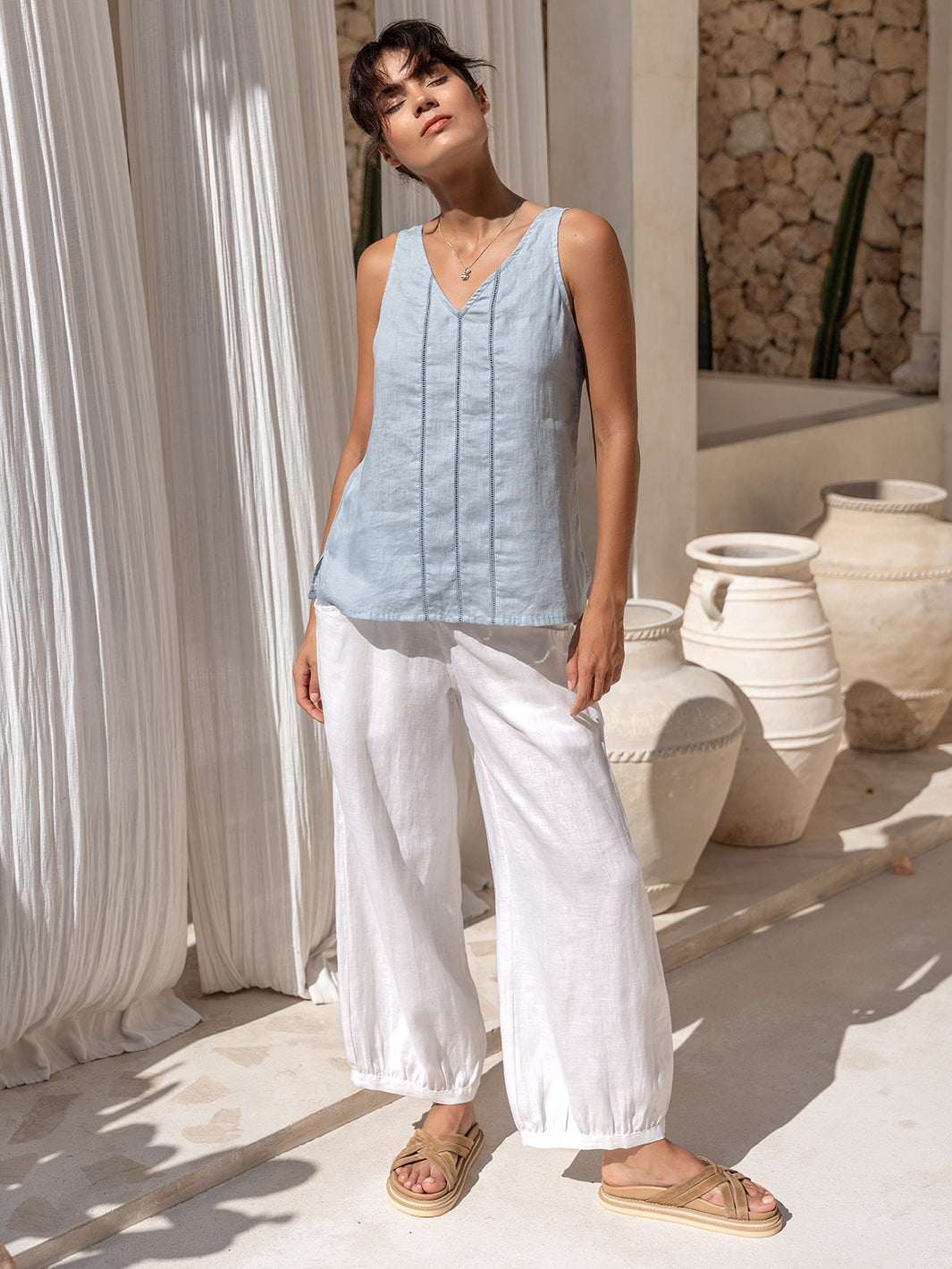 Model wears Giana Linen Top in Slate Blue