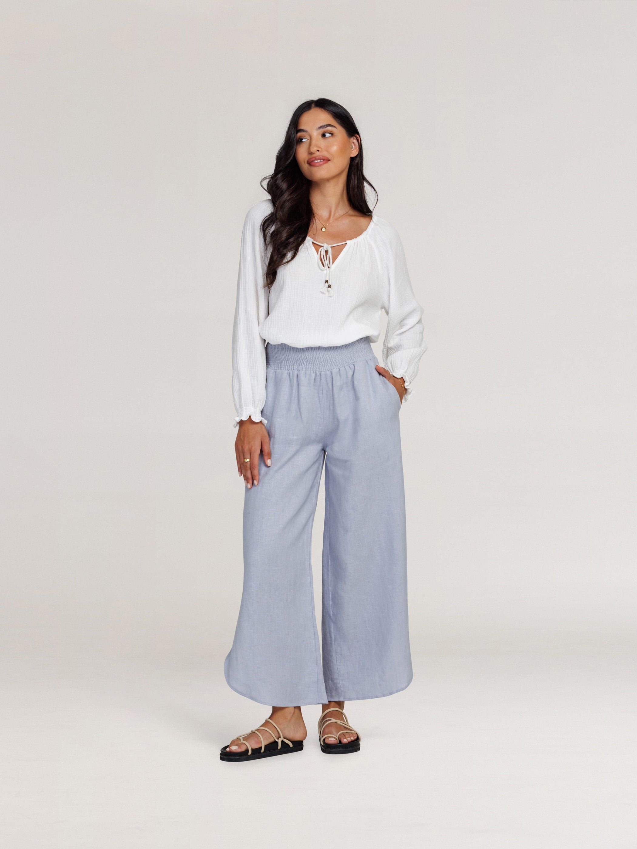 Model wears Sienna Linen Pants in Slate Blue