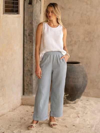 Model wears Sancia Cotton Pants in Slate Blue