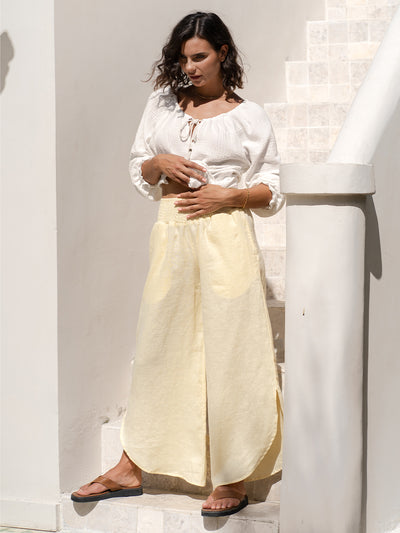 Model wears Sienna Linen Pants in Lemon