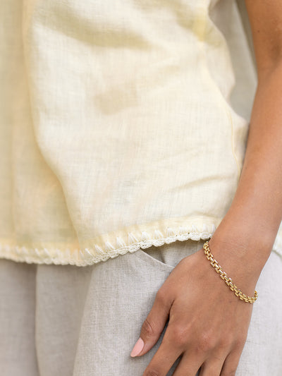 Model wears Tuscan Linen Top in Lemon